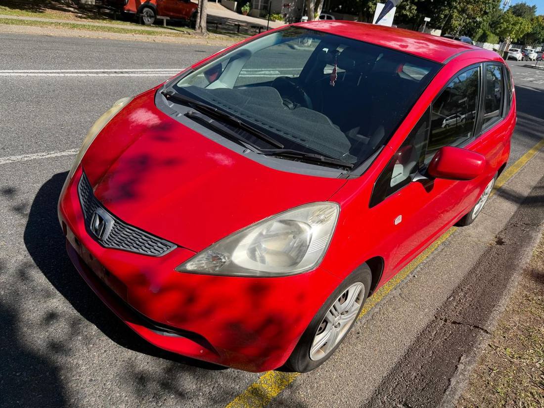 Flatbed tow truck removing a car — free towing across Brisbane